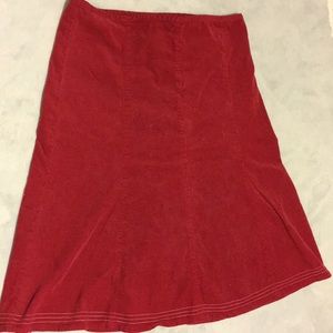 Red thin cord (cotton/spandex) knee length skirt.